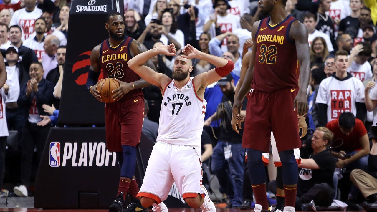 TORONTO, ON - MAY 01: Jonas Valanciunas #17 of the Toronto Raptors falls to his knees after missing a basket in the second half of Game One of the Eastern Conference Semifinals against the Cleveland Cavaliers during the 2018 NBA Playoffs at Air Canada Centre on May 1, 2018 in Toronto, Canada.