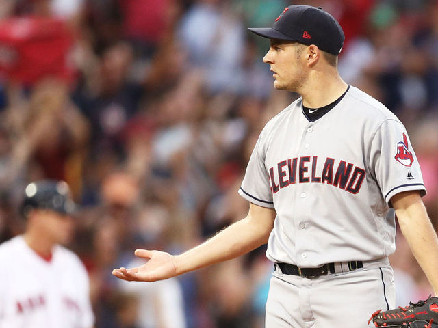 BOSTON, MA - AUGUST 14: Trevor Bauer #47 of the Cleveland Indians reacts after Rafael Devers #11 of the Boston Red Sox hit a home run during the fourth inning at Fenway Park on August 14, 2017 in Boston, Massachusetts.