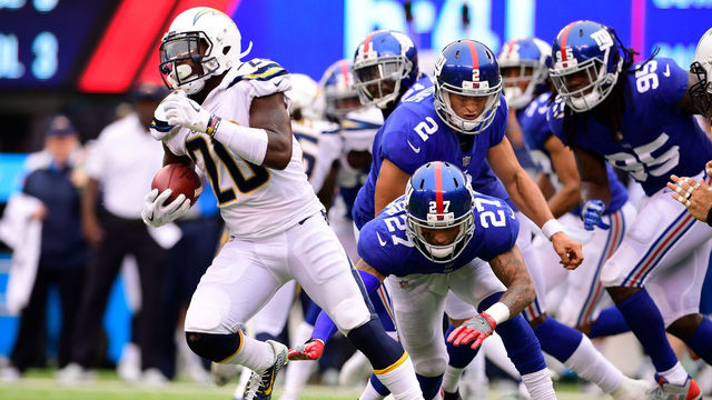 EAST RUTHERFORD, NJ - OCTOBER 08: Desmond King #20 of the Los Angeles Chargers attempts to break past Darian Thompson #27 of the New York Giants on the kickoff during an NFL game at MetLife Stadium on October 8, 2017 in East Rutherford, New Jersey. The Los Angeles Chargers defeated the New York Giants 27-22.