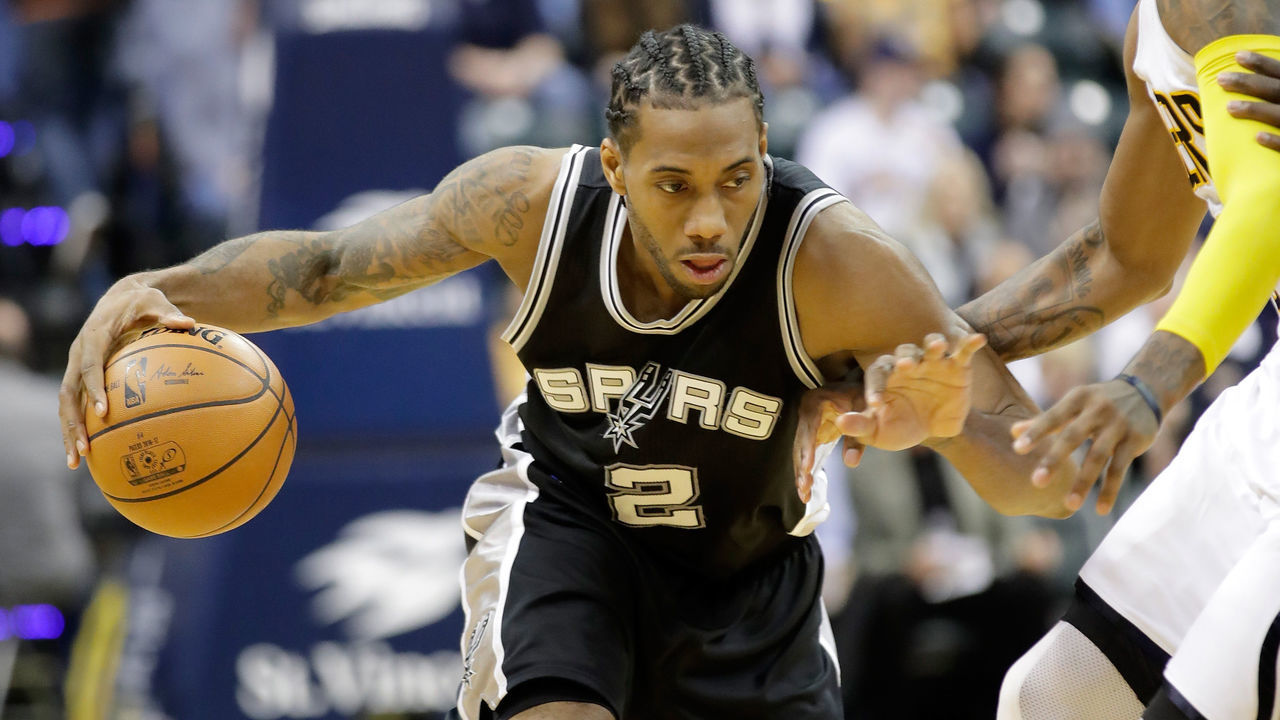 INDIANAPOLIS, IN - FEBRUARY 13: Kawhi Leonard #2 of the San Antonio Spurs dribbles the ball against the Indiana Pacers at Bankers Life Fieldhouse on February 13, 2017 in Indianapolis, Indiana.