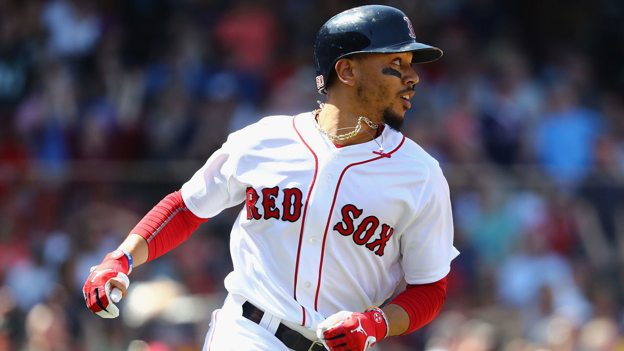 BOSTON, MA - MAY 02: Mookie Betts #50 of the Boston Red Sox runs the bases after hitting a solo home run during the fourth inning against the Kansas City Royals at Fenway Park on May 2, 2018 in Boston, Massachusetts.