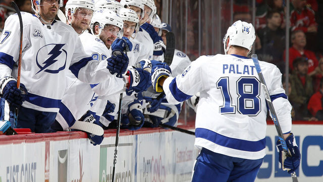 NEWARK, NJ - MARCH 24: Ondrej Palat #18 of the Tampa Bay Lightning celebrates with teammates after scoring a goal against the New Jersey Devils during the third period at the Prudential Center on March 24, 2018 in Newark, New Jersey. The Devils won 2-1.