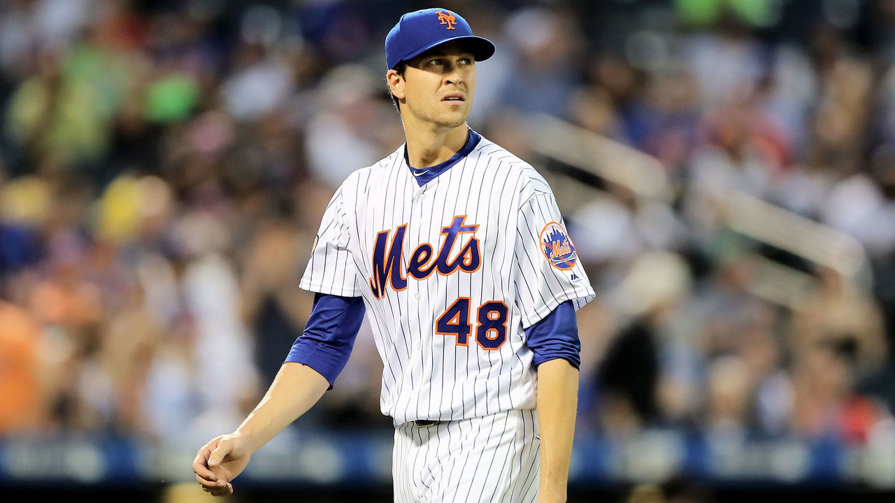 NEW YORK, NY - MAY 02: Jacob deGrom #48 of the New York Mets walks off the field after the fourth inning against the Atlanta Braves on May 2, 2018 at Citi Field in the Flushing neighborhood of the Queens borough of New York City.