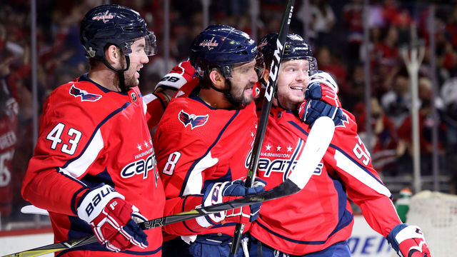 WASHINGTON, DC - APRIL 21: Evgeny Kuznetsov #92 of the Washington Capitals celebrates with Alex Ovechkin #8 and Tom Wilson #43 after scoring a second period goal Columbus Blue Jackets during Game Five of the Eastern Conference First Round during the 2018 NHL Stanley Cup Playoffs at Capital One Arena on April 21, 2018 in Washington, DC.