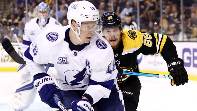 BOSTON, MA - MAY 2: David Pastrnak #88 of the Boston Bruins defends Ondrej Palat #18 of the Tampa Bay Lightning during the third period of Game Three of the Eastern Conference Second Round during the 2018 NHL Stanley Cup Playoffs at TD Garden on May 2, 2018 in Boston, Massachusetts. The Lightning defeat the Bruins 4-1.