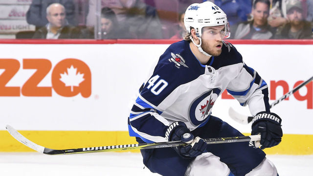 MONTREAL, QC - APRIL 03: Joel Armia #40 of the Winnipeg Jets skates against the Montreal Canadiens during the NHL game at the Bell Centre on April 3, 2018 in Montreal, Quebec, Canada. The Winnipeg Jets defeated the Montreal Canadiens 5-4 in overtime.
