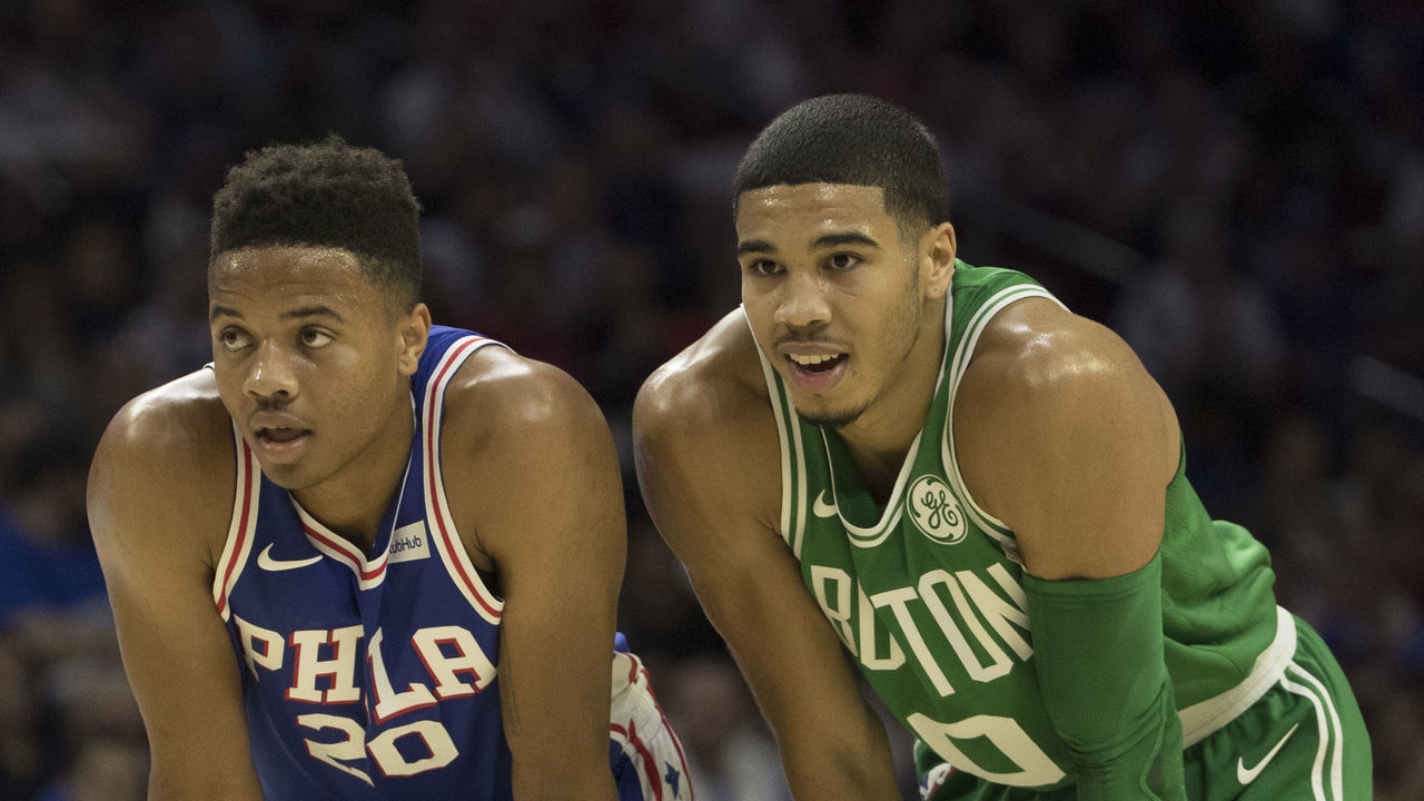 PHILADELPHIA, PA - OCTOBER 20: Markelle Fultz #20 of the Philadelphia 76ers stands next to Jayson Tatum #0 of the Boston Celtics during foul shots in the first half at the Wells Fargo Center on October 20, 2017 in Philadelphia, Pennsylvania. The Celtics defeated the 76ers 102-92.