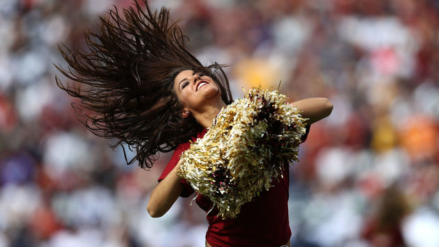 LANDOVER, MD - SEPTEMBER 18: A Washington Redskins cheerleader performs during a game against the Dallas Cowboys at FedExField on September 18, 2016 in Landover, Maryland.