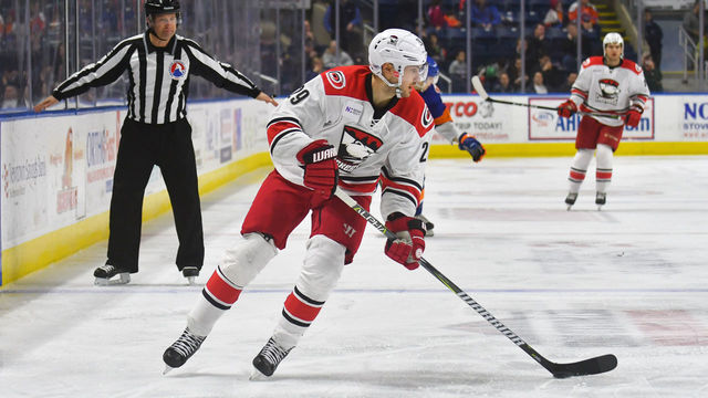 BRIDGEPORT, CT - FEBRUARY 25: Marcus Kruger #29 of the Charlotte Checkers controls the puck during a game against the Bridgeport Sound Tigers at the Webster Bank Arena on February 25, 2018 in Bridgeport, Connecticut.