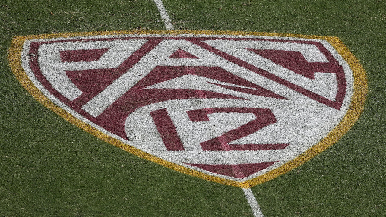 TEMPE, AZ - OCTOBER 19: The 'Pac 12' logo is displayed on the filed during the college football game between the Washington Huskies and the Arizona State Sun Devils at Sun Devil Stadium on October 19, 2013 in Tempe, Arizona. The Sun Devils defeated the Huskies 53-24.