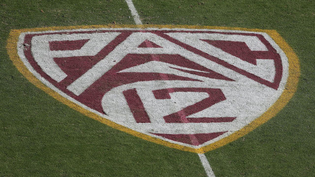 TEMPE, AZ - OCTOBER 19: The 'Pac 12' logo is displayed on the filed during the college football game between the Washington Huskies and the Arizona State Sun Devils at Sun Devil Stadium on October 19, 2013 in Tempe, Arizona. The Sun Devils defeated the Huskies 53-24.