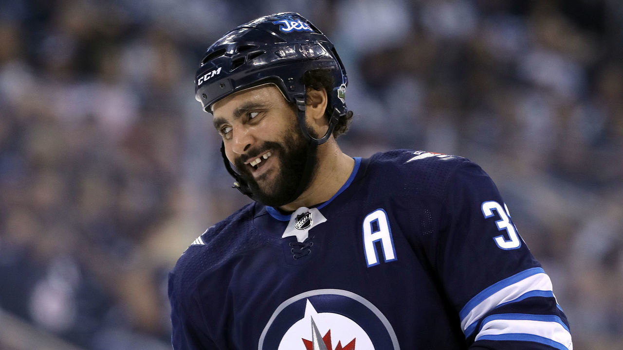 WINNIPEG, MANITOBA - APRIL 7: Dustin Byfuglien #33 of the Winnipeg Jets smiles after narrowly missed scoring against the Chicago Blackhawks during NHL action on April 7, 2018 at Bell MTS Place in Winnipeg, Manitoba.