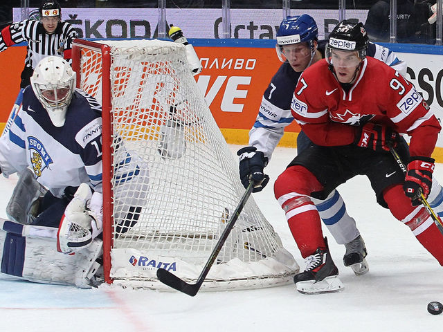 MOSCOW, RUSSIA - MAY 22: Connor McDavid #97 of Canada plays the puck against Esa Lindell #7 of Finland during the 2016 IIHF World Championship gold medal game at the Ice Palace on May 22, 2016 in Moscow, Russia. Canada defeated Finland 2-0.