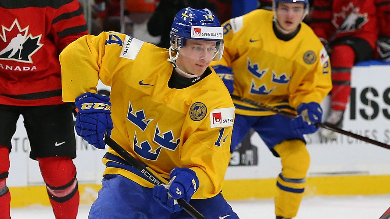 BUFFALO, NY - JANUARY 5: Elias Pettersson #14 of Sweden in play against Canada during the Gold medal game of the IIHF World Junior Championship at KeyBank Center on January 5, 2018 in Buffalo, New York. Canada beat Sweden 3-1.