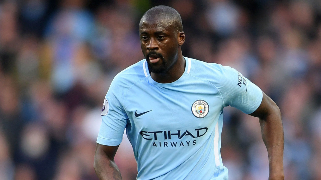 MANCHESTER, ENGLAND - APRIL 22: Yaya Toure of Manchester City runs with the ball during the Premier League match between Manchester City and Swansea City at Etihad Stadium on April 22, 2018 in Manchester, England.