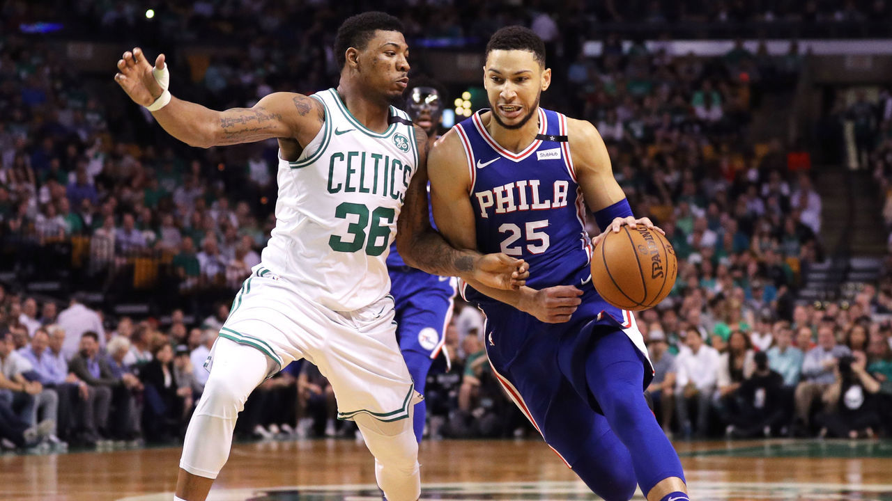 BOSTON, MA - MAY 3: Ben Simmons #25 of the Philadelphia 76ers drives against Marcus Smart #36 of the Boston Celtics during the first quarter of Game Two of the Eastern Conference Second Round of the 2018 NBA Playoffs at TD Garden on May 3, 2018 in Boston, Massachusetts.