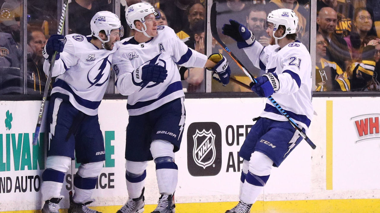 BOSTON, MA - MAY 2: Ondrej Palat #18 of the Tampa Bay Lightning celebrates with Tyler Johnson #9 and Brayden Point #21 after scoring a goal against the Boston Bruins during the first period Game Three of the Eastern Conference Second Round during the 2018 NHL Stanley Cup Playoffs at TD Garden on May 2, 2018 in Boston, Massachusetts.