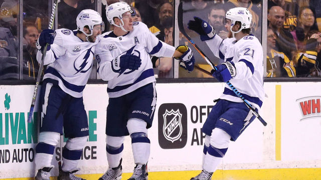 BOSTON, MA - MAY 2: Ondrej Palat #18 of the Tampa Bay Lightning celebrates with Tyler Johnson #9 and Brayden Point #21 after scoring a goal against the Boston Bruins during the first period Game Three of the Eastern Conference Second Round during the 2018 NHL Stanley Cup Playoffs at TD Garden on May 2, 2018 in Boston, Massachusetts.