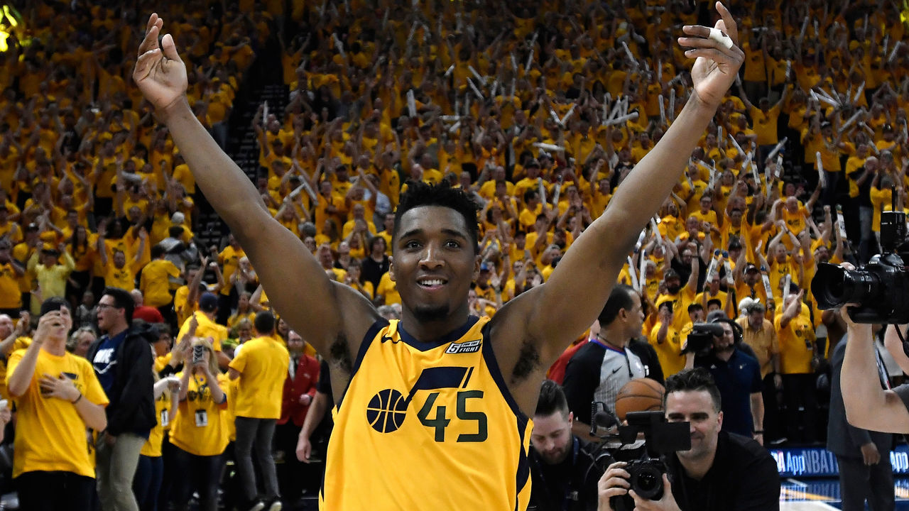 SALT LAKE CITY, UT - APRIL 27: Donovan Mitchell #45 of the Utah Jazz celebrates the Jazz win at the end of Game Six of Round One of the 2018 NBA Playoffs against the Oklahoma City Thunder at Vivint Smart Home Arena on April 27, 2018 in Salt Lake City, Utah. The Jazz beat the Thunder 96-91 to advance to the second round of the NBA Playoffs.