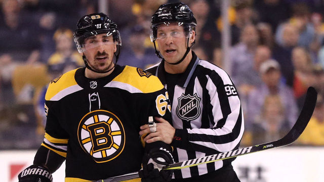BOSTON, MA - MAY 2: Brad Marchand #63 of the Boston Bruins disputes a slashing call during the second period of Game Three of the Eastern Conference Second Round during the 2018 NHL Stanley Cup Playoffs against the Tampa Bay Lightning at TD Garden on May 2, 2018 in Boston, Massachusetts.
