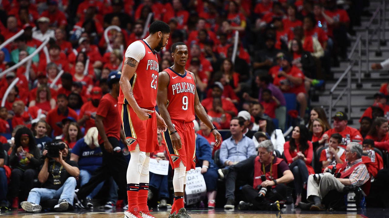 NEW ORLEANS, LA - APRIL 21: Anthony Davis #23 of the New Orleans Pelicans speaks with Rajon Rondo #9 during the second half of Game Four of the first round of the Western Conference playoffs against the Portland Trail Blazers at the Smoothie King Center on April 21, 2018 in New Orleans, Louisiana. The Pelicans defeated the Trail Blazers 131-123 to sweep the series 4-0.