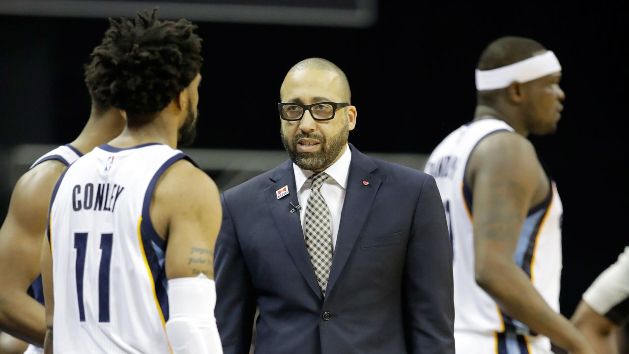 MEMPHIS, TN - APRIL 20: David Fizdale the head coach of the Memphis Grizzlies gives instructions to Mike Conley #11 against the San Antonio Spurs in game three of the Western Conference Quarterfinals during the 2017 NBA Playoffs at FedExForum on April 20, 2017 in Memphis, Tennessee.