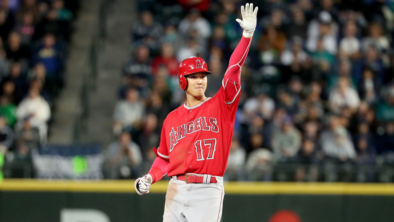 SEATTLE, WA - MAY 04: Shohei Ohtani #17 of the Los Angeles Angels signals to the dugout after hitting an RBI double in the fifth inning against the Seattle Mariners during their game at Safeco Field on May 4, 2018 in Seattle, Washington.