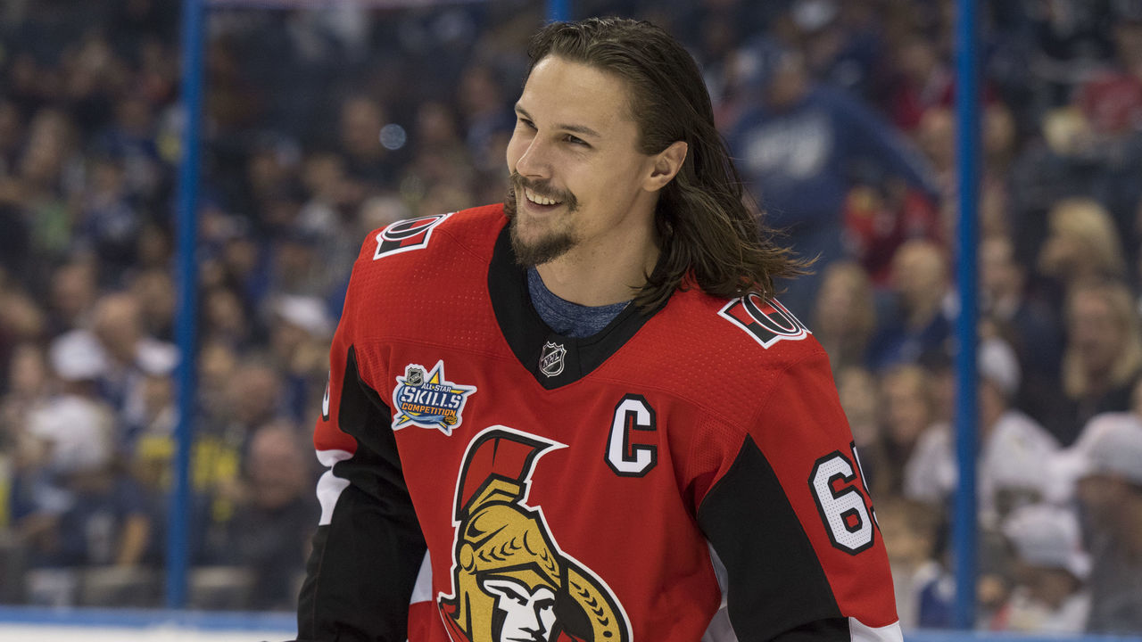 TAMPA, FL - JANUARY 27: Atlantic Division defender Erik Karlsson (65) has a laugh after he competes in the puck control competition during the NHL All-Star Skills Competition on January 27, 2018, at Amalie Arena in Tampa, FL.