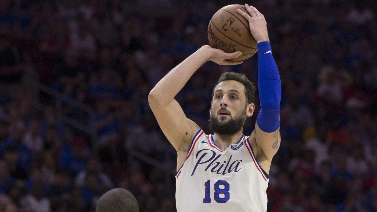 PHILADELPHIA, PA - APRIL 14: Marco Belinelli #18 of the Philadelphia 76ers shoots the ball against Wayne Ellington #2 of the Miami Heat in the second quarter during Game One of the first round of the 2018 NBA Playoff at Wells Fargo Center on April 14, 2018 in Philadelphia, Pennsylvania. The 76ers defeated the Heat 130-103.