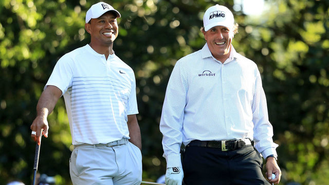 AUGUSTA, GA - APRIL 03: Tiger Woods and Phil Mickelson of the United States talk on the 11th hole during a practice round prior to the start of the 2018 Masters Tournament at Augusta National Golf Club on April 3, 2018 in Augusta, Georgia.