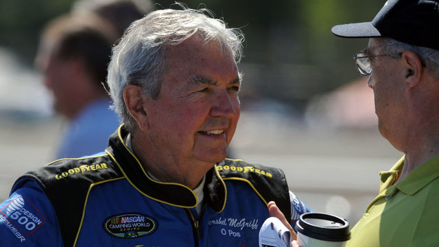 PORTLAND, OR - JULY 19: Hershel McGriff (L) speaks with fans in the pit area before qualifying for the NASCAR Camping World Series West BI-MART Salute to the Troops 125 at Portland International Raceway on July 19, 2009 in Portland, Oregon.