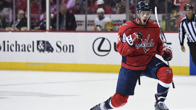 WASHINGTON, DC - MAY 05: John Carlson #74 of the Washington Capitals celebrates after scoring a first period goal against the Pittsburgh Penguins in Game Five of the Eastern Conference Second Round during the 2018 NHL Stanley Cup Playoffs at Capital One Arena on May 5, 2018 in Washington, DC.
