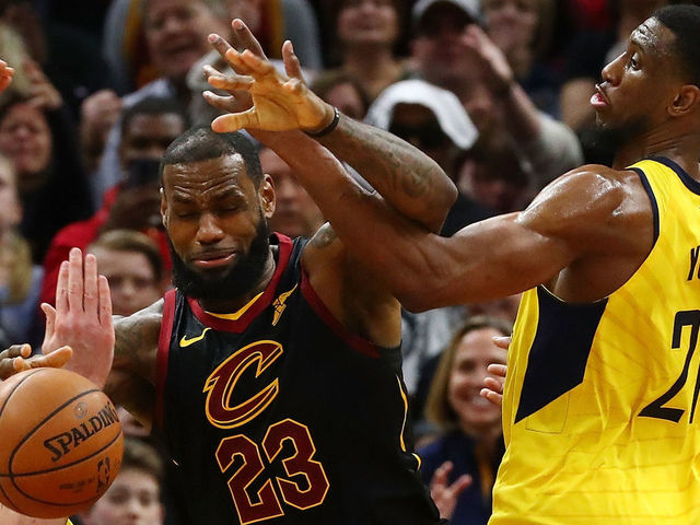 CLEVELAND, OH - APRIL 29: LeBron James #23 of the Cleveland Cavaliers battles for the ball with Thaddeus Young #21 and Domantas Sabonis #11 of the Indiana Pacers during the second half of Game Seven of the Eastern Conference Quarterfinals during the 2018 NBA Playoffs at Quicken Loans Arena on April 29, 2018 in Cleveland, Ohio.