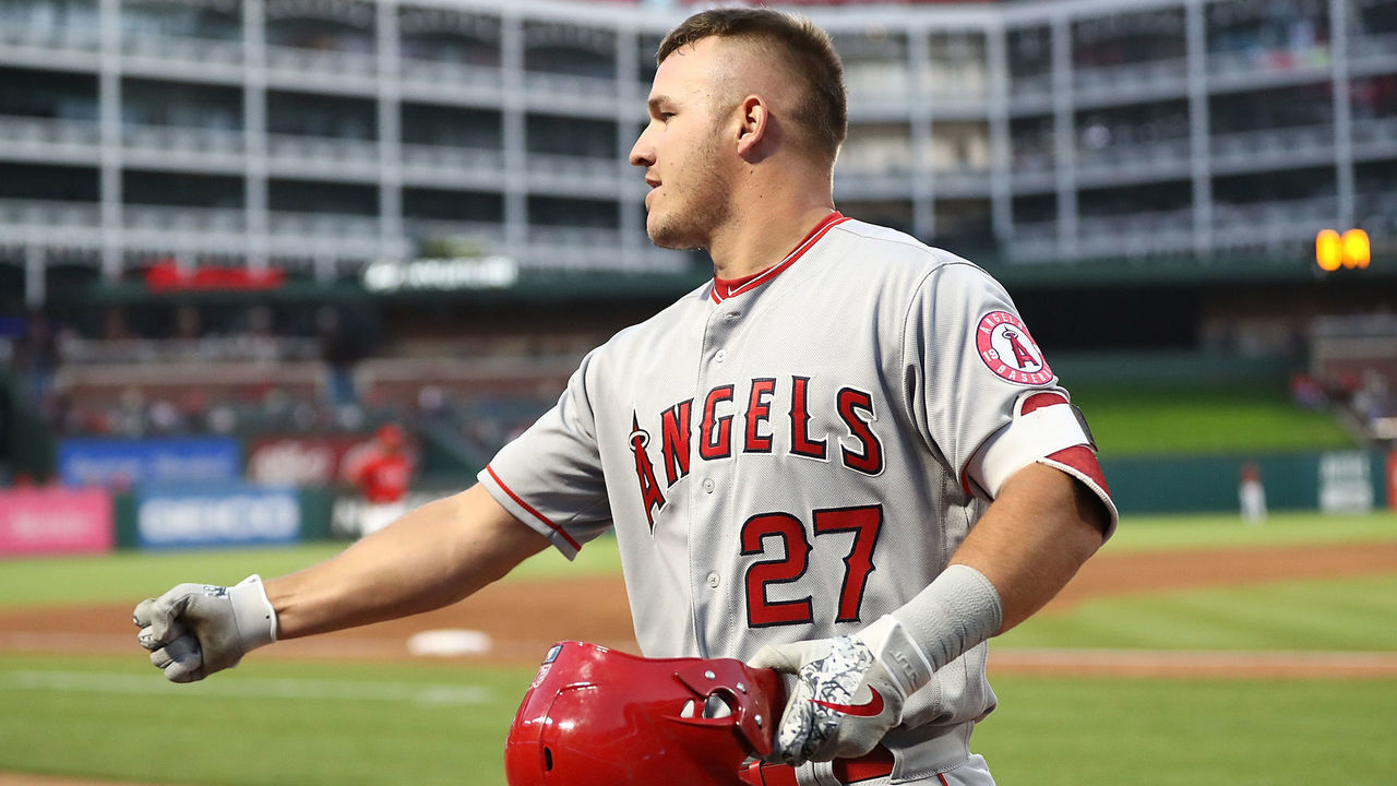 ARLINGTON, TX - APRIL 10: Mike Trout #27 of the Los Angeles Angels celebrates a homerun in the second inning against the Texas Rangers at Globe Life Park in Arlington on April 10, 2018 in Arlington, Texas.