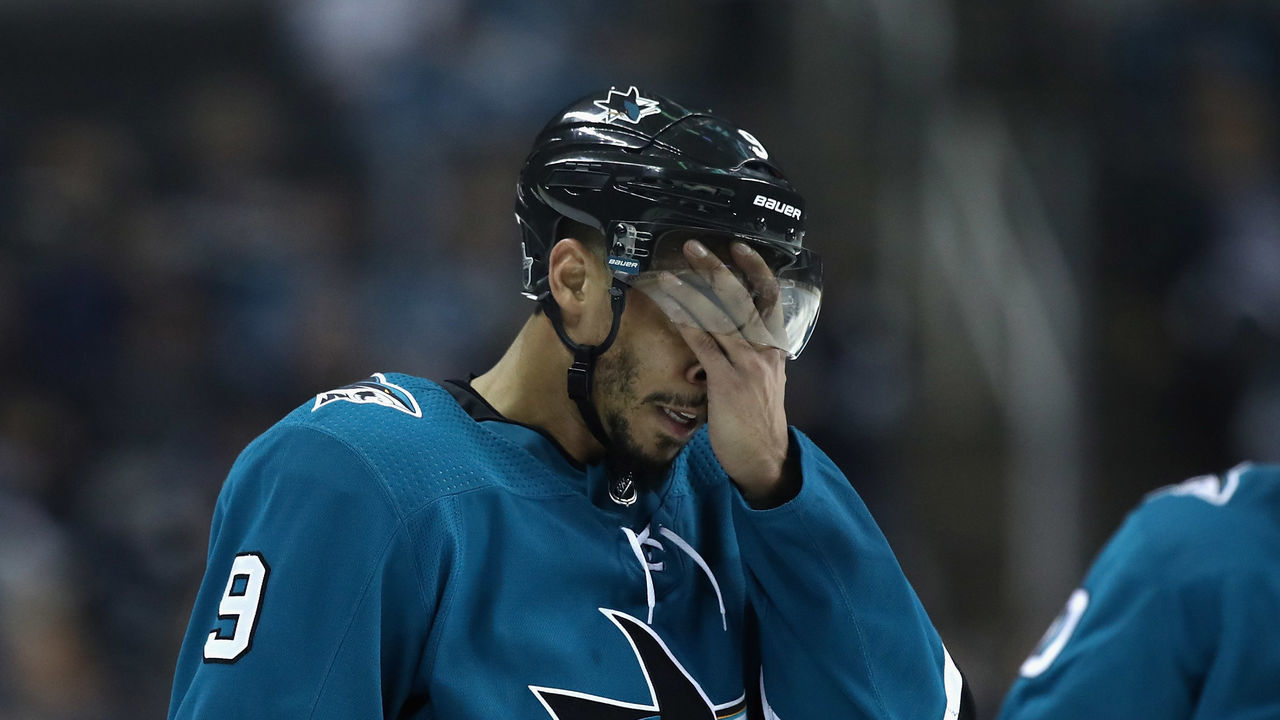 SAN JOSE, CA - MAY 06: Evander Kane #9 of the San Jose Sharks wipes his face after they lost to the Vegas Golden Knights Game Six of the Western Conference Second Round during the 2018 NHL Stanley Cup Playoffs at SAP Center on May 6, 2018 in San Jose, California.