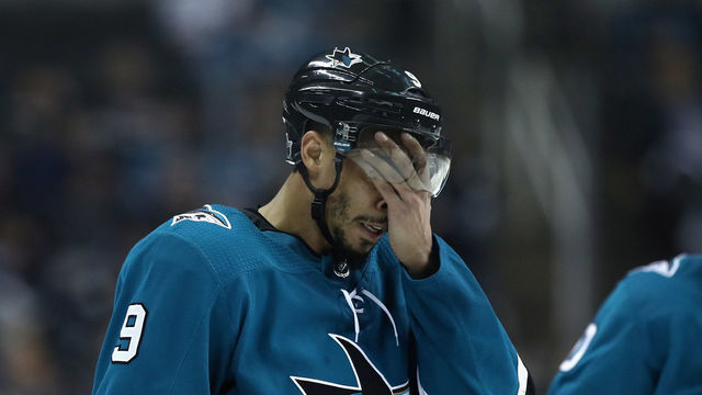 SAN JOSE, CA - MAY 06: Evander Kane #9 of the San Jose Sharks wipes his face after they lost to the Vegas Golden Knights Game Six of the Western Conference Second Round during the 2018 NHL Stanley Cup Playoffs at SAP Center on May 6, 2018 in San Jose, California.