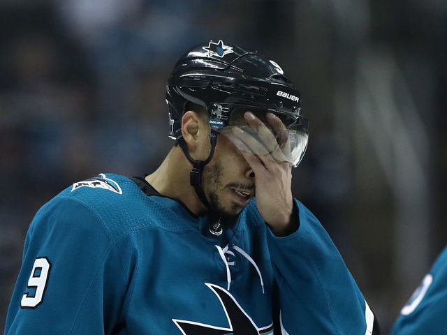 SAN JOSE, CA - MAY 06: Evander Kane #9 of the San Jose Sharks wipes his face after they lost to the Vegas Golden Knights Game Six of the Western Conference Second Round during the 2018 NHL Stanley Cup Playoffs at SAP Center on May 6, 2018 in San Jose, California.