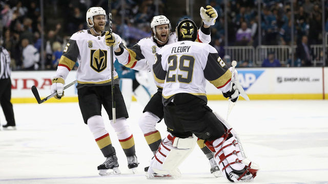 SAN JOSE, CA - APRIL 30: Colin Miller #6 and Jon Merrill #15 congratulate Marc-Andre Fleury #29 of the Vegas Golden Knights after they beat the San Jose Sharks in Game Three of the Western Conference Second Round during the 2018 NHL Stanley Cup Playoffs at SAP Center on April 30, 2018 in San Jose, California.