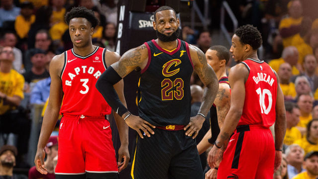 CLEVELAND, OH - MAY 7: LeBron James #23 of the Cleveland Cavaliers reacts to a call by officials as OG Anunoby #3 of the Toronto Raptors looks on during the first half of Game 4 of the second round of the Eastern Conference playoffs at Quicken Loans Arena on May 7, 2018 in Cleveland, Ohio.