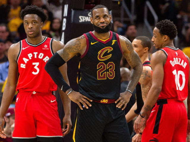 CLEVELAND, OH - MAY 7: LeBron James #23 of the Cleveland Cavaliers reacts to a call by officials as OG Anunoby #3 of the Toronto Raptors looks on during the first half of Game 4 of the second round of the Eastern Conference playoffs at Quicken Loans Arena on May 7, 2018 in Cleveland, Ohio.