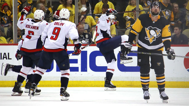 PITTSBURGH, PA - MAY 07: Evgeny Kuznetsov #92 of the Washington Capitals celebrates his overtime winning goal to win the series against the Pittsburgh Penguins in Game Six of the Eastern Conference Second Round during the 2018 NHL Stanley Cup Playoffs at PPG Paints Arena on May 7, 2018 in Pittsburgh, Pennsylvania. Washington won the game 2-1 in overtime