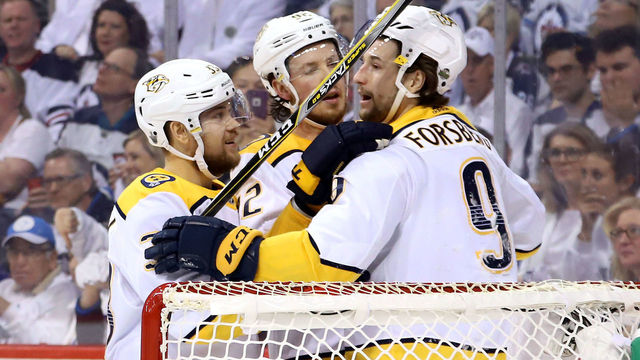 WINNIPEG, MB - MAY 7: Viktor Arvidsson #33, Ryan Johansen #92 and Filip Forsberg #9 of the Nashville Predators celebrate a second period goal against the Winnipeg Jets in Game Six of the Western Conference Second Round during the 2018 NHL Stanley Cup Playoffs at the Bell MTS Place on May 7, 2018 in Winnipeg, Manitoba, Canada.