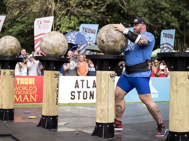 Hafthor Julius Bjornsson of Iceland lifts a concrete sphere during the Atlas Stones competition of the 2018 World's Strongest Man in Manila on May 6, 2018.