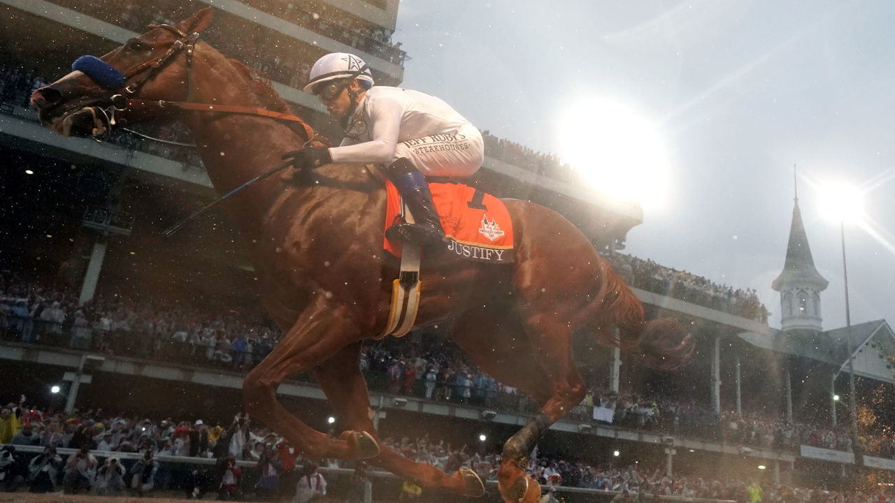 LOUISVILLE, KY - MAY 05: Justify #7, ridden by jockey Mike Smith crosses the finish line to win the 144th running of the Kentucky Derby at Churchill Downs on May 5, 2018 in Louisville, Kentucky.