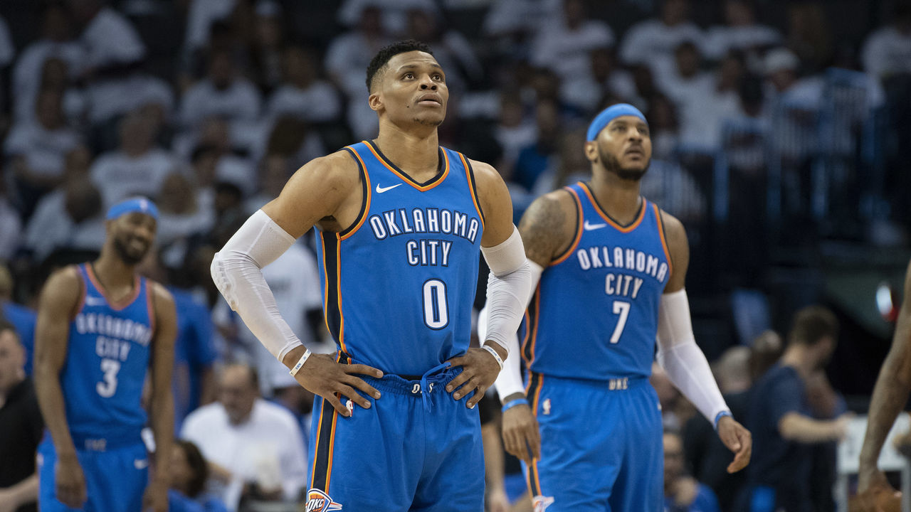 OKLAHOMA CITY, OK - APRIL 25: Russell Westbrook #0 of the Oklahoma City Thunder and Carmelo Anthony #7 of the Oklahoma City Thunder watch the game clock during the second half of game 5 of the Western Conference playoffs against the Utah Jazz at the Chesapeake Energy Arena on April 25, 2018 in Oklahoma City, Oklahoma.