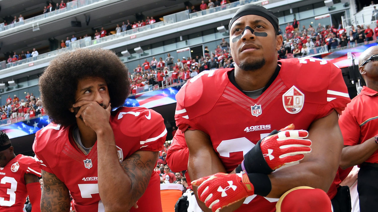 SANTA CLARA, CA - OCTOBER 02: (L-R) Eli Harold #58, Colin Kaepernick #7 and Eric Reid #35 of the San Francisco 49ers kneel on the sideline during the anthem prior to the game against the Dallas Cowboys at Levi's Stadium on October 2, 2016 in Santa Clara, California.