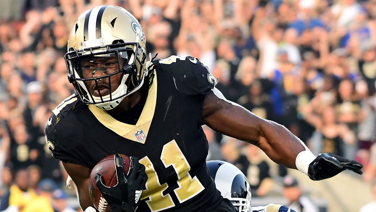 LOS ANGELES, CA - NOVEMBER 26: Alvin Kamara #41 of the New Orleans Saints is chased down by John Johnson #43 of the Los Angeles Rams during the fourth quarter at the Los Angeles Memorial Coliseum on November 26, 2017 in Los Angeles, California.