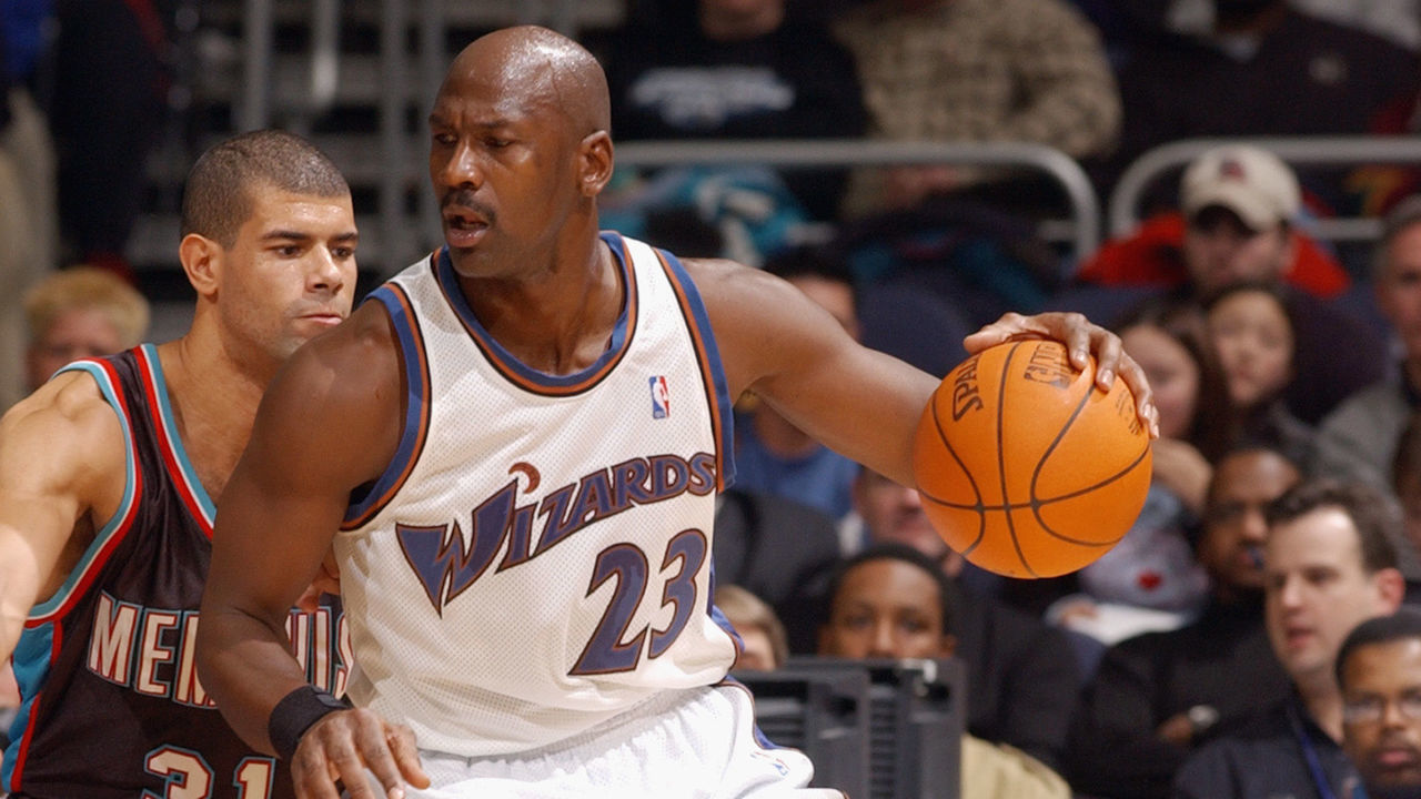 WASHINGTON - DECEMBER 18: Guard Michael Jordan #23 of the Washington Wizards drives against forward Shane Battier #31 of the Memphis Grizzlies during the game at MCI Center on December 18, 2002 in Washington, DC. The Wizards won 118-100.