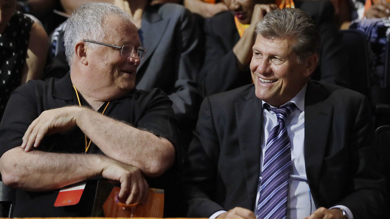 KNOXVILLE, TN - JULY 14: Chattanooga women's basketball coach Jim Foster, left, speaks with Connecticut women's basketball coach Geno Auriemma, right, before a ceremony to celebrate the life of former Tennessee women's basketball coach Pat Summitt on July 14, 2016 at the Thompson-Boling Arena in Knoxville, Tennessee.. Summitt died June 28 at the age of 64, five years after being diagnosed with Alzheimer's disease.
