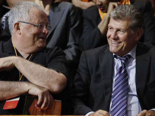 KNOXVILLE, TN - JULY 14: Chattanooga women's basketball coach Jim Foster, left, speaks with Connecticut women's basketball coach Geno Auriemma, right, before a ceremony to celebrate the life of former Tennessee women's basketball coach Pat Summitt on July 14, 2016 at the Thompson-Boling Arena in Knoxville, Tennessee.. Summitt died June 28 at the age of 64, five years after being diagnosed with Alzheimer's disease.
